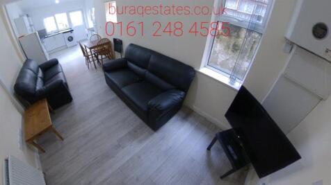 Bright open plan living space with stylish sofa...