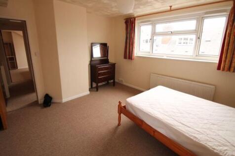 Bright, unfurnished double bedroom with a large...