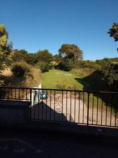 Sitting Room terrace view over lawn 