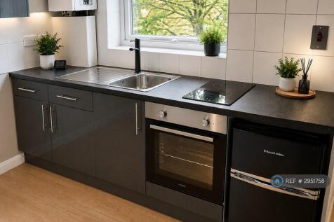 Kitchen Area With Oven Fridge Etc