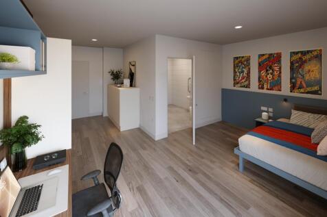 Bright, contemporary double bedroom with a stud...