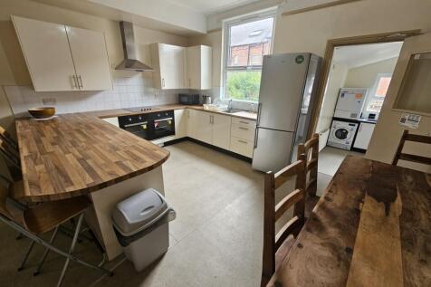 Bright and well-maintained kitchen featuring mo...