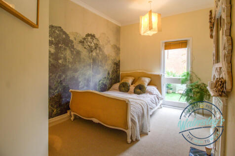 Rear bedroom with balcony from landing