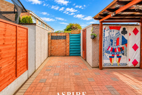 Vivid Courtyard with King Card Mural.png
