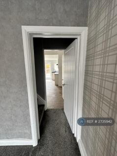 Living Room To Stairs And Kitchen