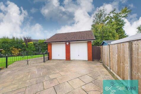 Double Detached Garage/Driveway