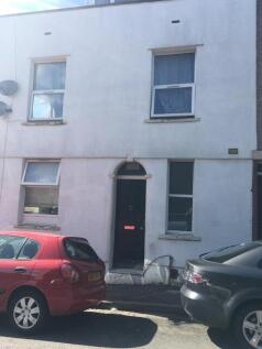 Street-facing two-storey property with a white ...