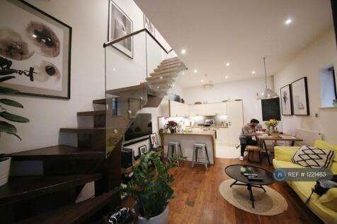 Living Area With Floating Staircase