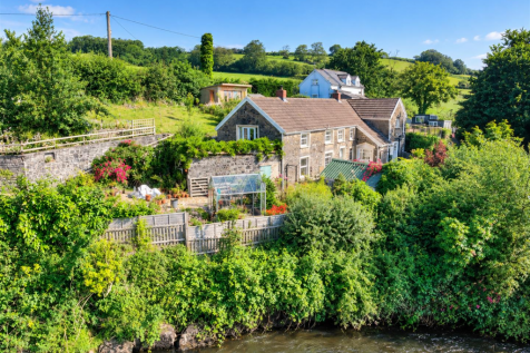 Idyllic Cottage Garden by the Stream.png
