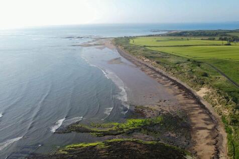 Aerial view of the beach and coastline near Amble 
