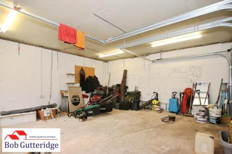 DETACHED BRICK-BUILT DOUBLE GARAGE
