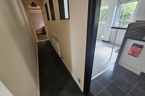 A clear exterior shot showing the front facade ...