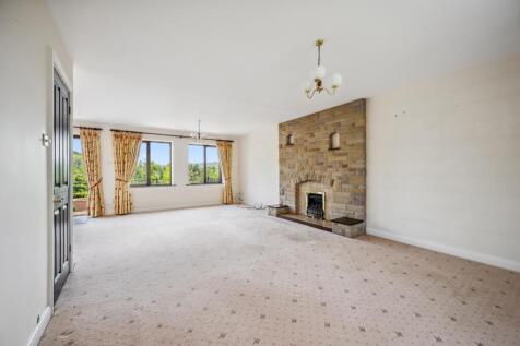 Lounge to fireplace and windows.jpg