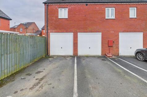 two parking spaces and two garages