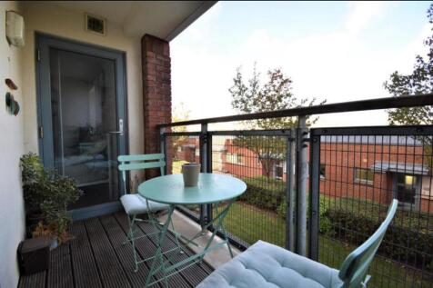 Private balcony with charming bistro seating...