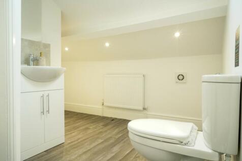 A modern and clean bathroom with stylish fixtur...