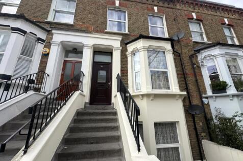 Classic terraced house with bay window and rais...