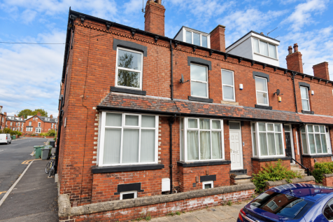 Red-Brick Victorian Terrace on a Sunny Street