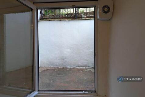 Basement Patio Door Leading To Courtyard