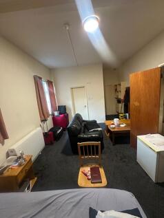 Bright, furnished living space with a comfortab...