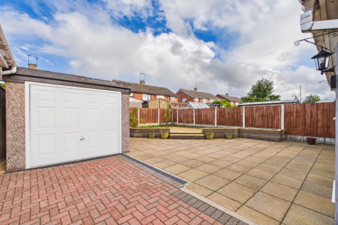 Rear Garden With Garage