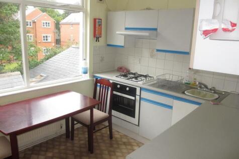 Bright and functional kitchen with ample natura...