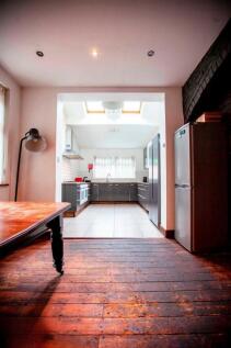 Bright modern kitchen with dining space...