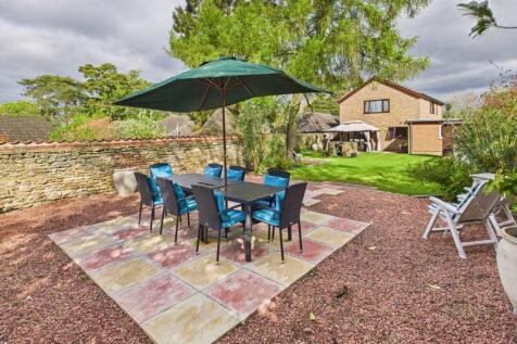 Rear paved seating area