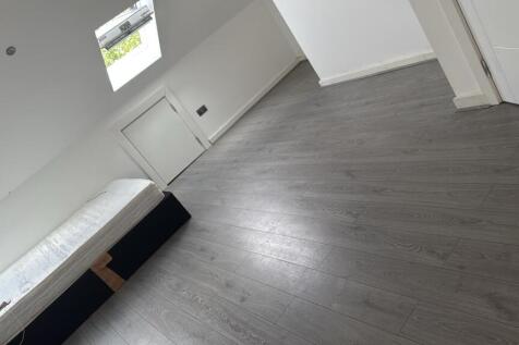 Spacious modern room with sleek wood-sleek wood...