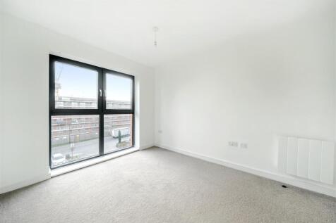 Bright and airy bedroom with modern finish...