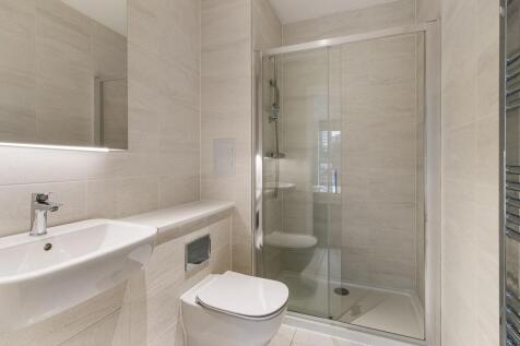 Experience the elegance of contemporary design in this luxurious bathroom space.