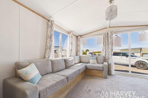 static caravan lounge with corner sofa and large w