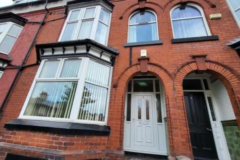 Attractive red-brick terraced property with a b...