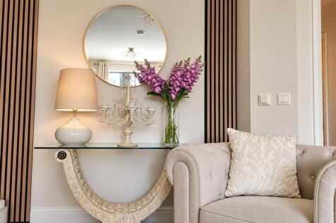 Elegant Console, Mirror and Tufted Sofa.jpg