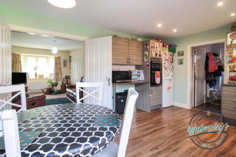 Kitchen through to sitting room