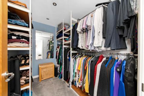 BEDROOM ONE WALK-IN WARDROBE