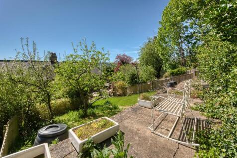 Rear Garden - seating and apple trees.jpg