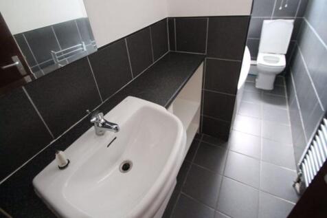 A modern and well-maintained bathroom featuring...