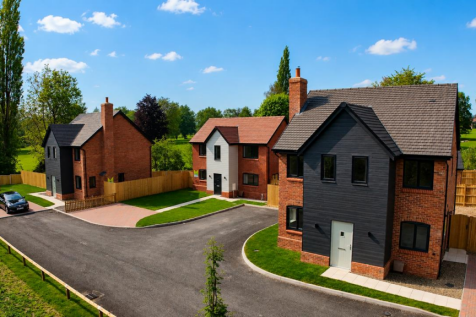 Close frontage of 3 x detached.png