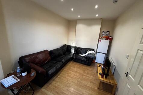 Comfortable lounge with an L-shaped leather sof...