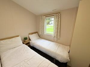 Twin Bedroom With Two Single Beds And Storage