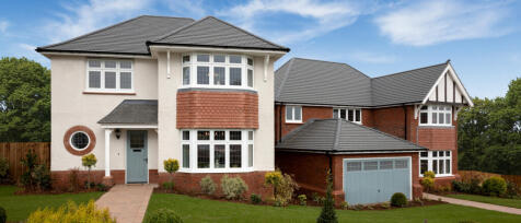 Modern two-storey house with a white and red brick exterior, grey roof, large bay windows, and a wel