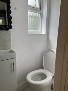 Bright and tidy cloakroom with natural light...