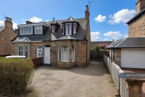 Front Of House And Gravel Drive