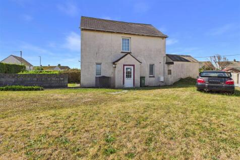Side garden and house.