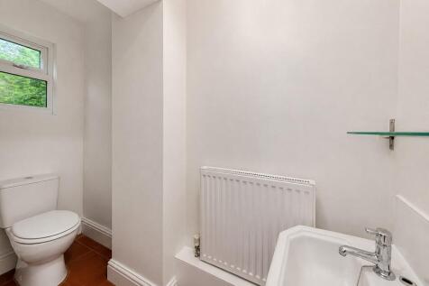 Bright and spotlessly clean modern WC...