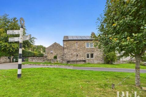 Across village green toward rear of the property