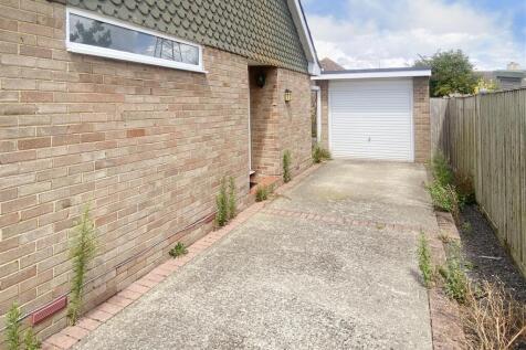 Long Driveway Leading to Garage