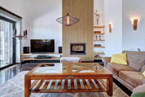 feature wooden floor to ceiling fireplace back drop