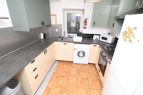 Modern U-shaped kitchen with ample workspace...